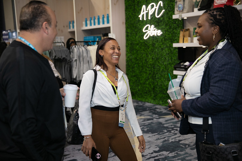 Sponsors interacting with attendees