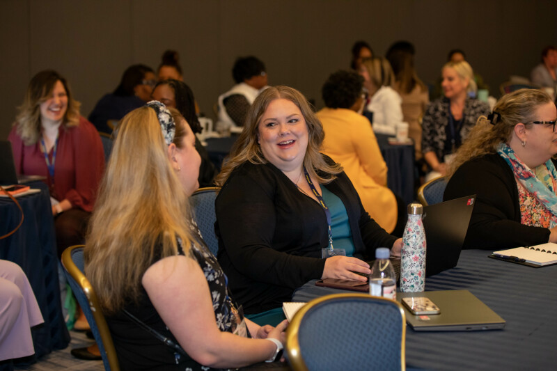 Attendees in conversation at EA Ignite Spring 2023.